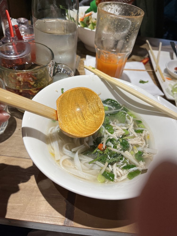 Crispy Vietnamese banh mi sandwich with fresh cilantro